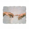 A criação de Adam por Michelangelo, pintado à mão (detalhe)