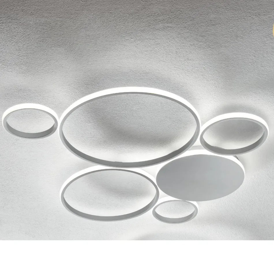 Candeeiro de parede LED moderno com acabamento em metal dourado ou prateado - Punto Viadurini