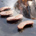 Churrasqueira a lenha com placa de cozinha e compartimento de madeira - Ferran Viadurini