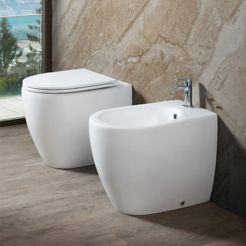 Bidê de chão Aster em cerâmica fosca, disponível em duas cores e com design moderno. Viadurini