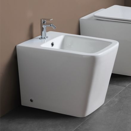 Bidê de chão com furo único em cerâmica branca com design moderno e elegante - Giunco Viadurini