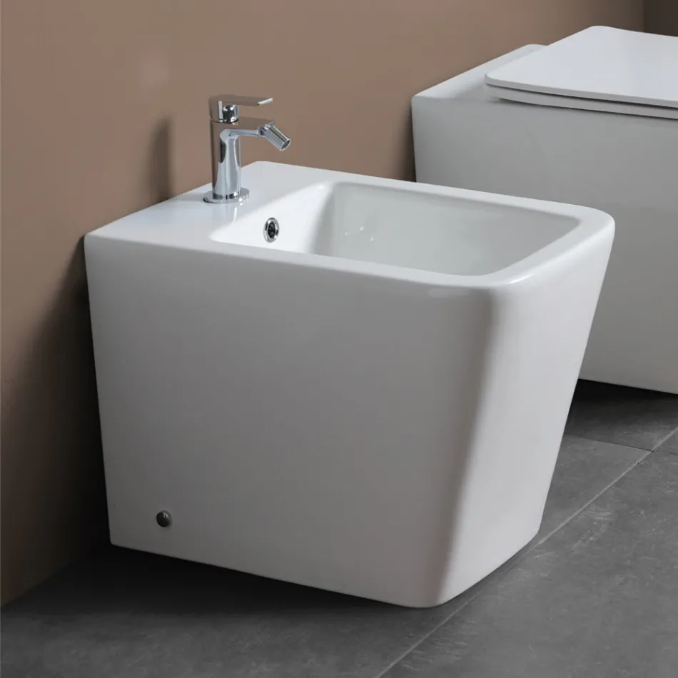 Bidê de chão com furo único em cerâmica branca com design moderno e elegante - Giunco Viadurini