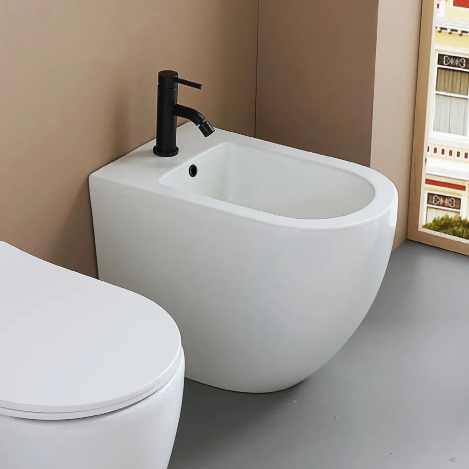 Bidê de chão com um único orifício, em cerâmica branca resistente e com design moderno - Olmo Viadurini