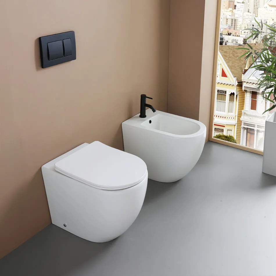 Bidê de chão com um único orifício, em cerâmica branca resistente e com design moderno - Olmo Viadurini
