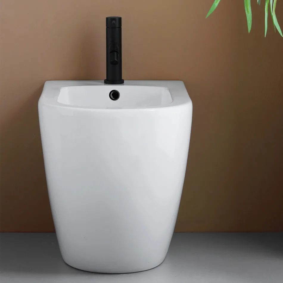 Bidê de chão com um único orifício, em cerâmica branca resistente e com design moderno - Olmo Viadurini