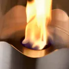 Lareira a bioetanol com mesa de aço inox e vidro Leon, fabricada na Itália Viadurini