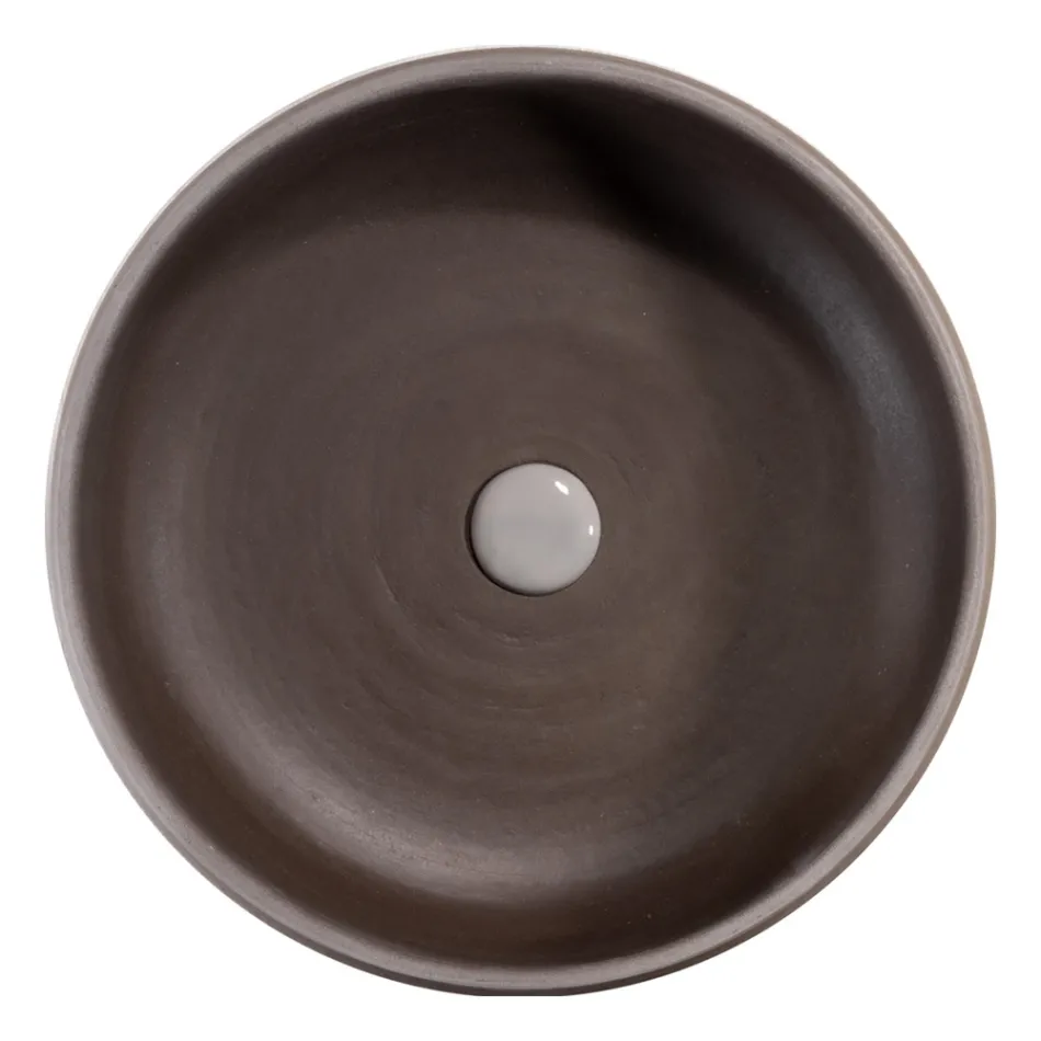 Composição de banheiro cinza com espelho redondo e vários acessórios - Maryse Viadurini