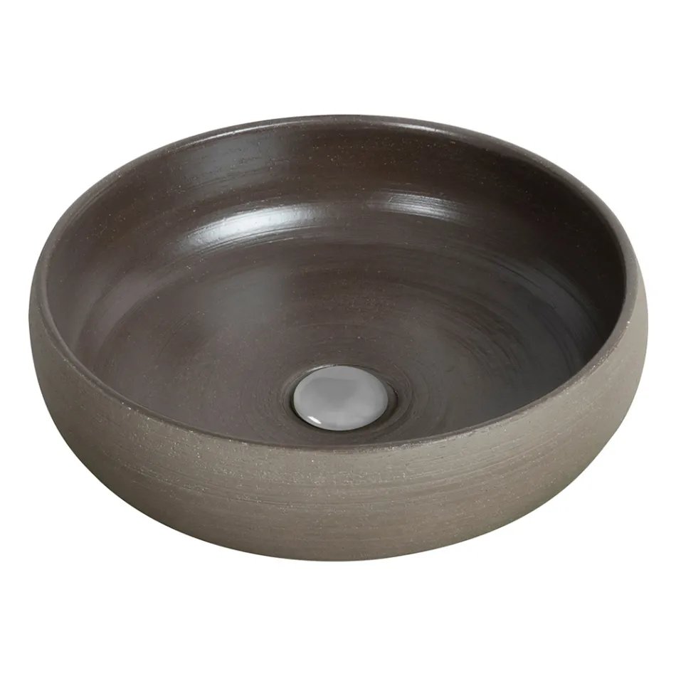 Composição de banheiro cinza com espelho redondo e vários acessórios - Maryse Viadurini