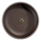 Composição de armário de banheiro com piso verde e acessórios esmaltados - Maryse Viadurini