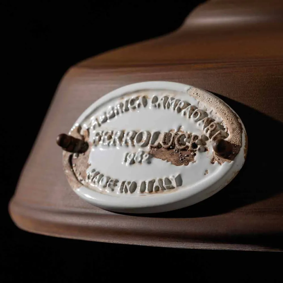 Suspensão de ferro antigo de lâmpada e cerâmica Teresa Ferroluce Viadurini