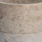 Lavatório autônomo para banheiro com acabamento em mármore marfim e formato cilíndrico - Cremino Viadurini