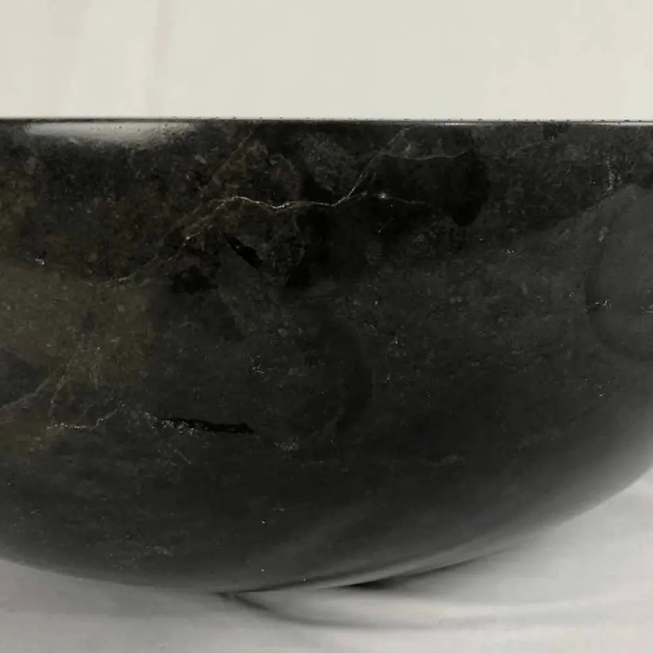 Lavatório preto redondo de bancada em pedra natural Levi, peça única Viadurini