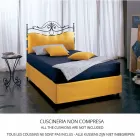 Uma cama e uma lira de ferro forjado meio quadrado Viadurini