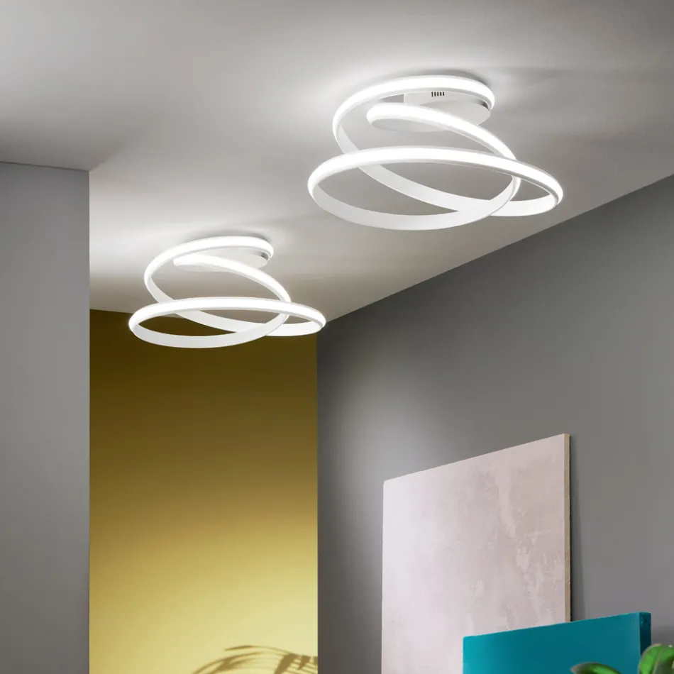 Lâmpada de teto LED de metal pintado de branco com design moderno - Rivolta Viadurini