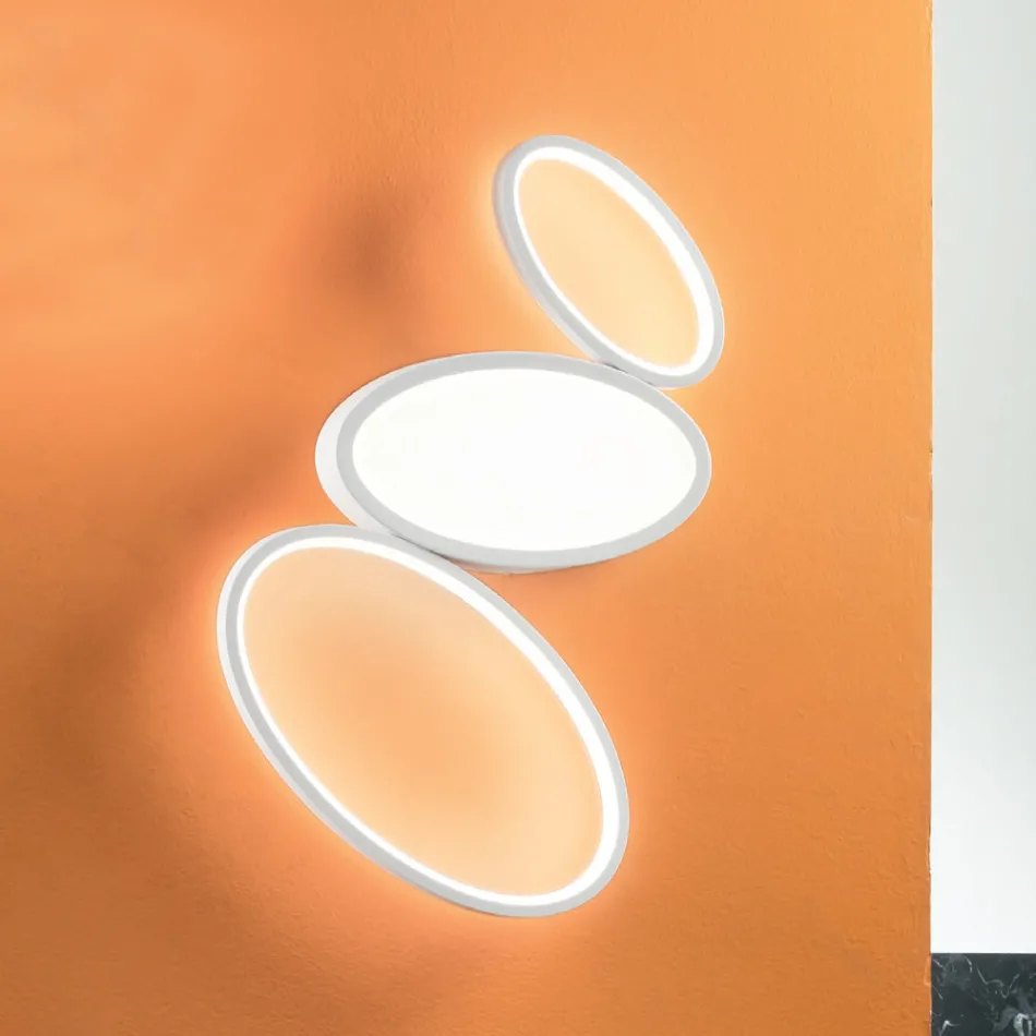 Lâmpada de teto LED regulável moderna em metal branco ou dourado - Raissa Viadurini