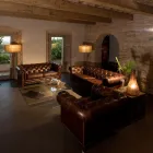 Poltrona Sala de Estar em Couro Vintage com Efeito Envelhecido com Rodas e Braços - Selo Viadurini