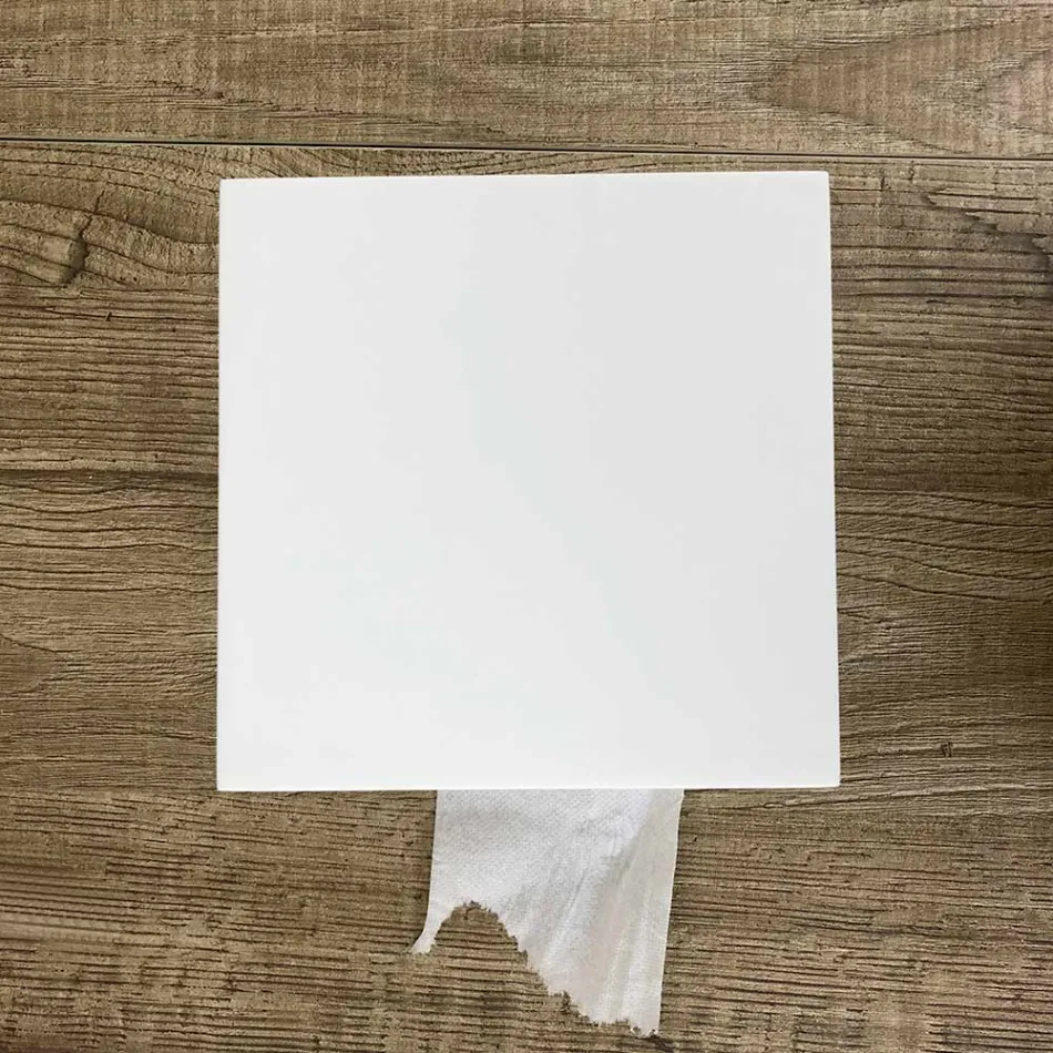 Porta-rolos para banheiro em Corian Branco ou com Insertos Pretos Design Italiano - Elono Viadurini