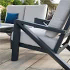 Sala de estar composta por sofá, mesa de centro e poltronas com apoio para os pés - Quadro de avisos Viadurini