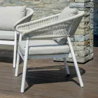 Sala de estar exterior com almofadas arredondadas e apoios de braços - Zenith Viadurini