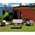 Rattan Garden Lounge com mesa de centro de madeira e almofadas - Hugues Viadurini