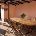 Mesa de jardim extensível design até 200 cm oval em madeira - Roxen Viadurini