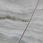 Mesa extensível da sala com tampo em formato de barril em cerâmica fabricada na Itália - Vidros Viadurini