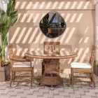 Mesa redonda ao ar livre em polyrattan com tampo de vidro - Gigi Viadurini