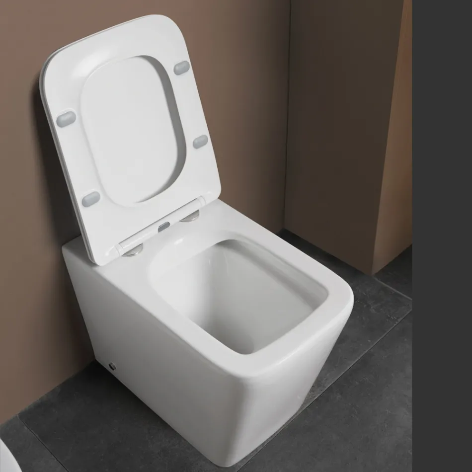 Vaso sanitário de chão com assento cerâmico de fechamento suave e design moderno - Giunco Viadurini