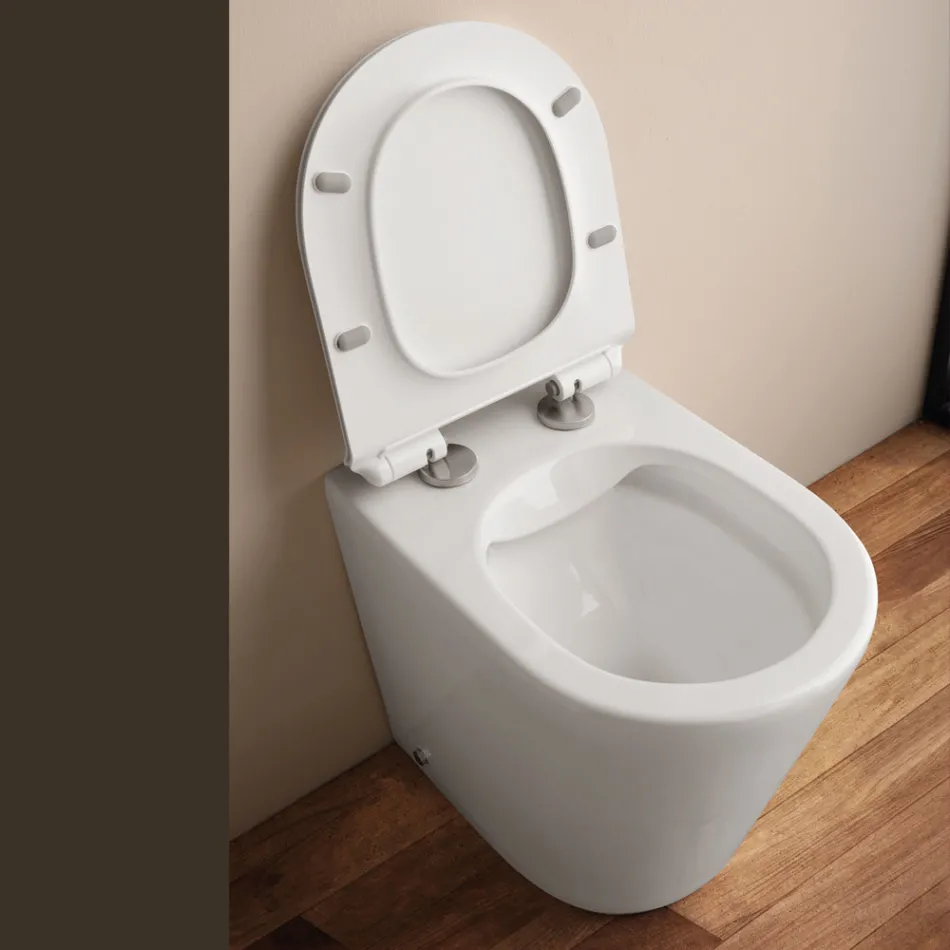Vaso sanitário de chão sem aro com assento de fechamento suave em cerâmica branca - Juniper   Viadurini
