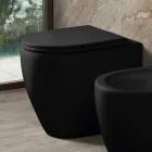 Vaso sanitário Aster bicolor em cerâmica fosca, sem aro, com assento de fechamento suave.   Viadurini