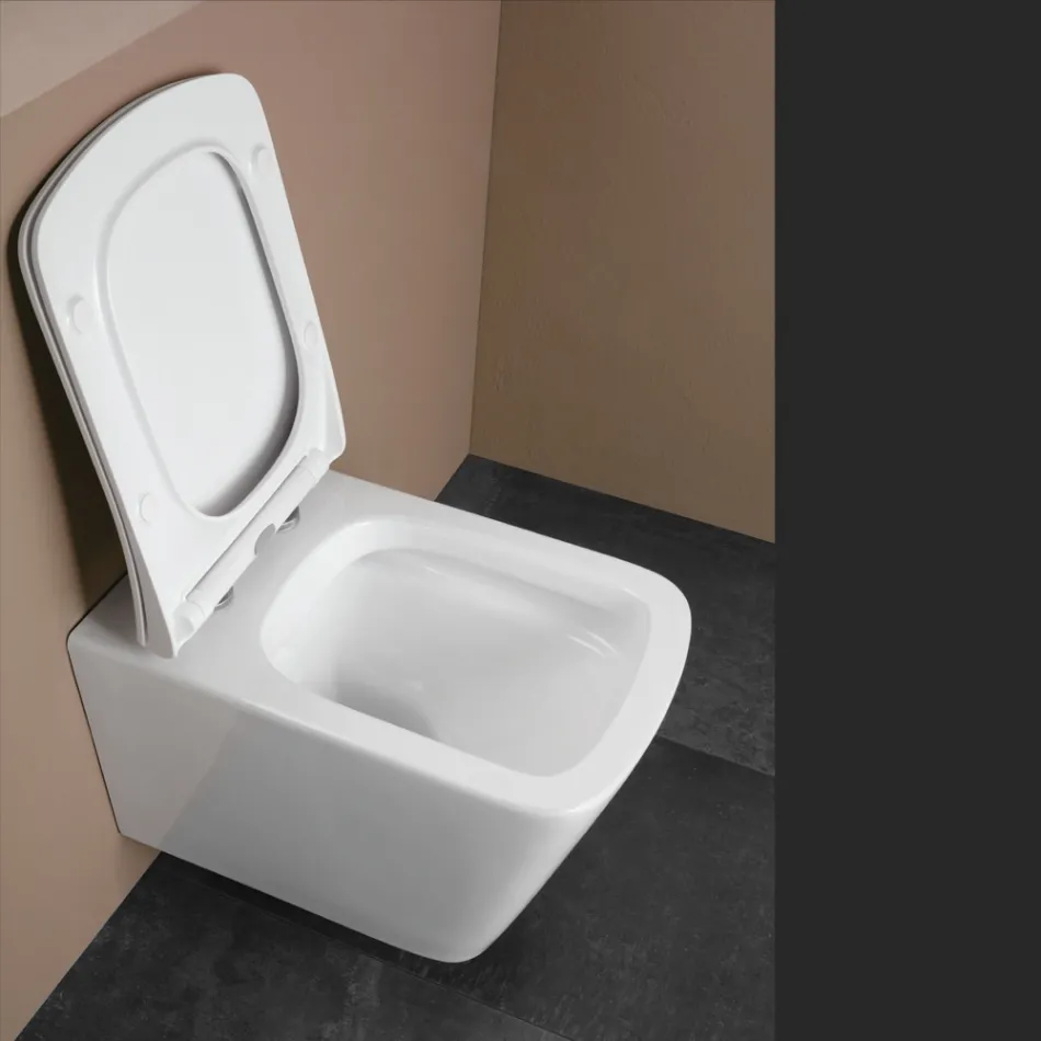 Sanitário suspenso com assento cerâmico de fecho suave e design moderno - Giunco Viadurini