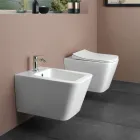 Sanitário suspenso com assento cerâmico de fecho suave e design moderno - Giunco Viadurini